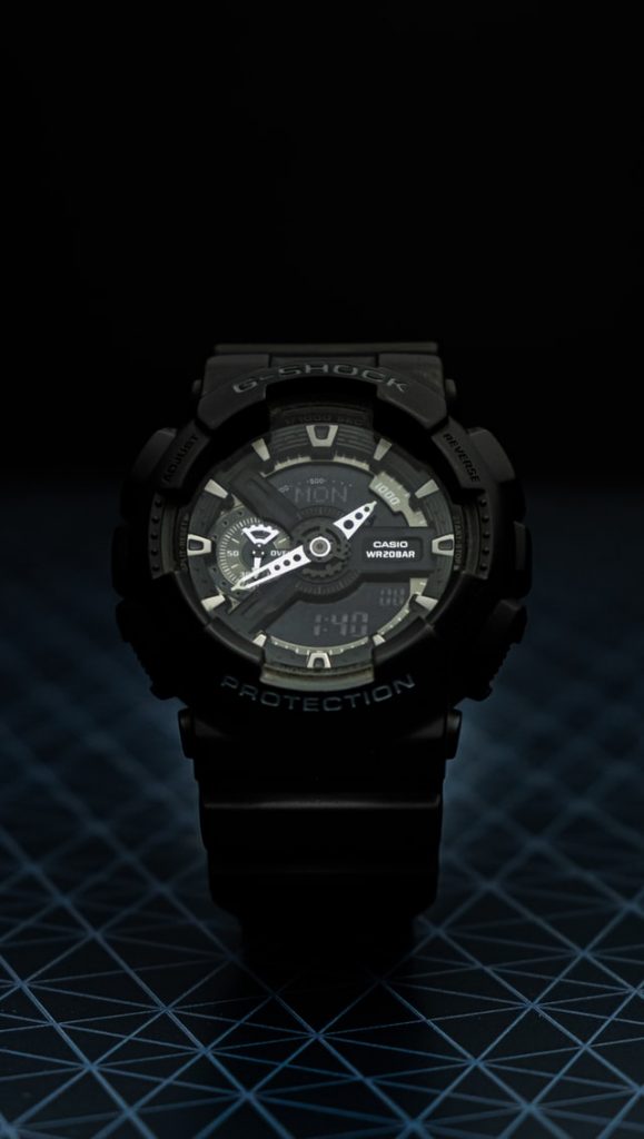 black g-shock military watch with dark dial