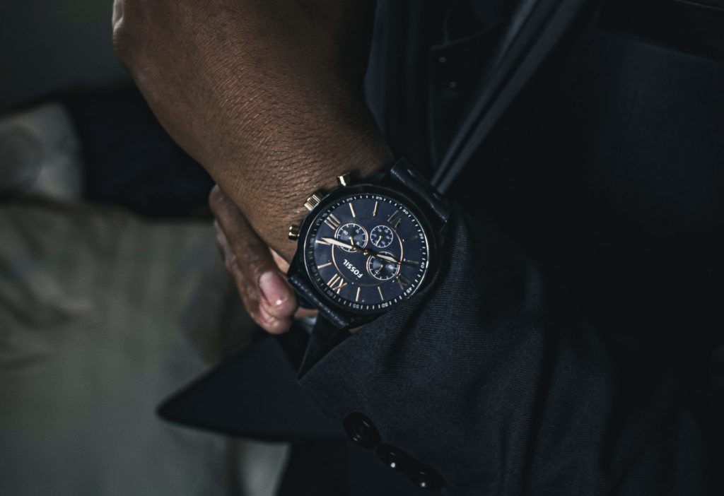 fashionably designed Fossil wristwatch on a man's wrist