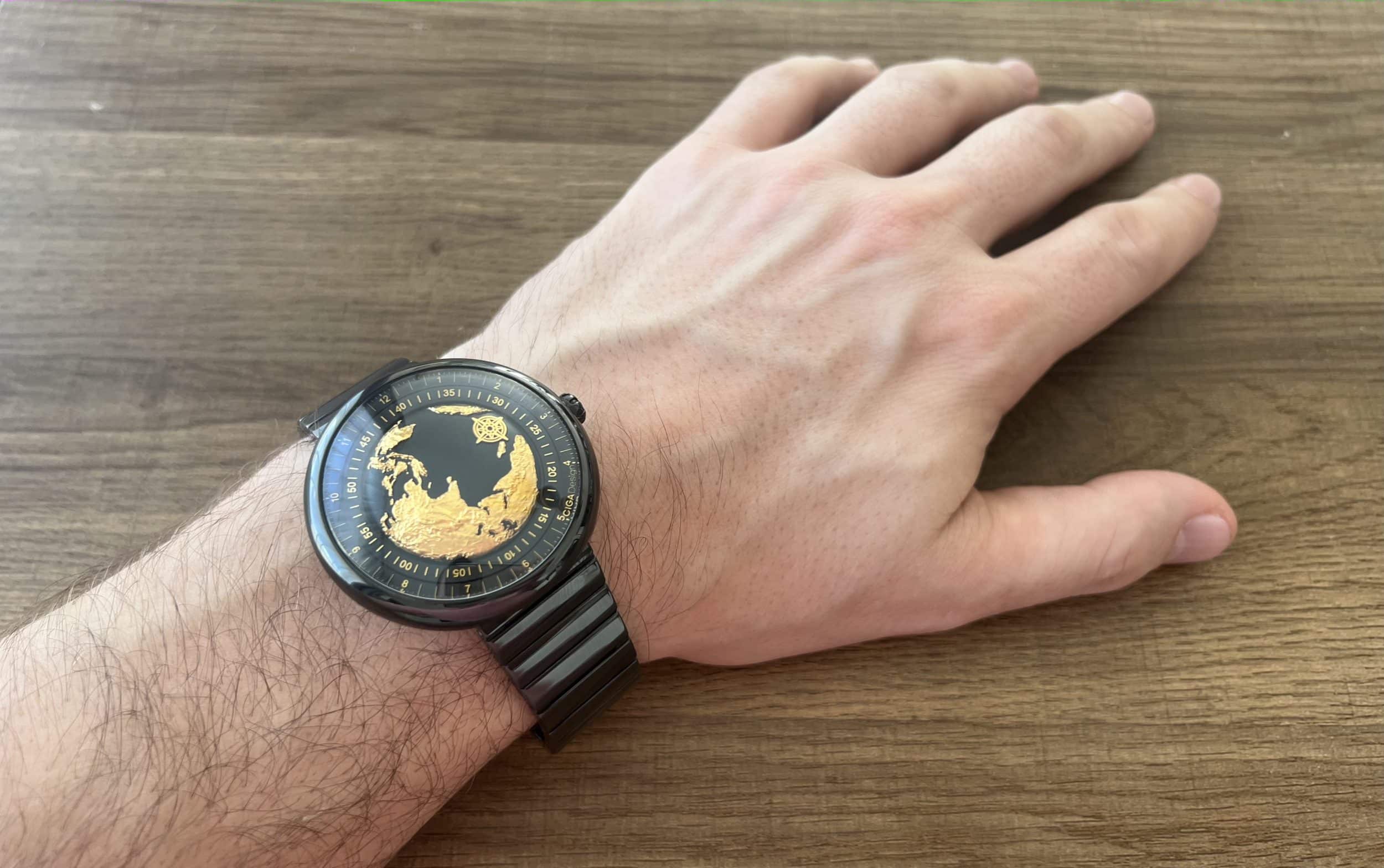 Ciga Design gold gilded timepiece on a wrist