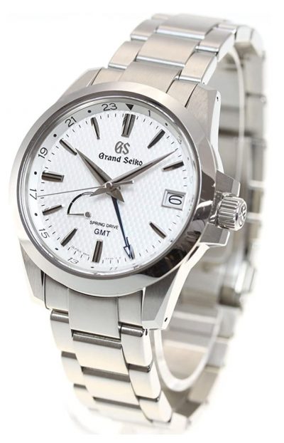 Luxurious metal watch with white dial and sweeping second hand