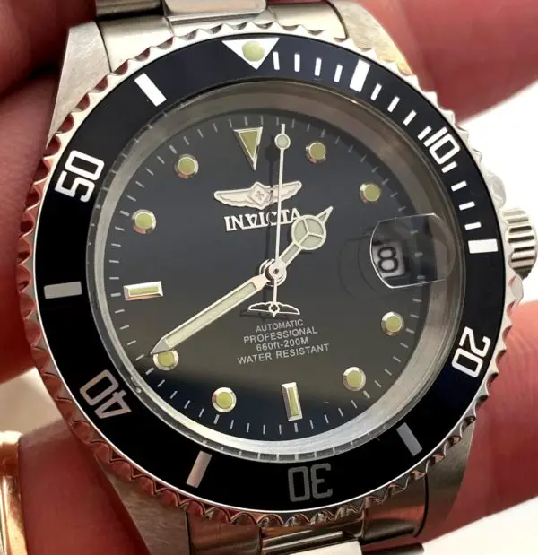 Black dial and bezel of Invicta Pro Diver watch