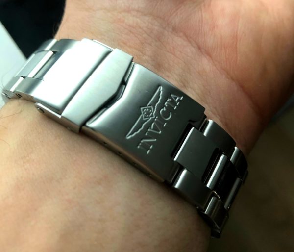 A metal watch band with double security clasp
