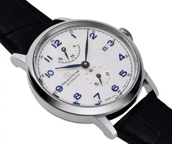 Orient Star watch with classy apparel