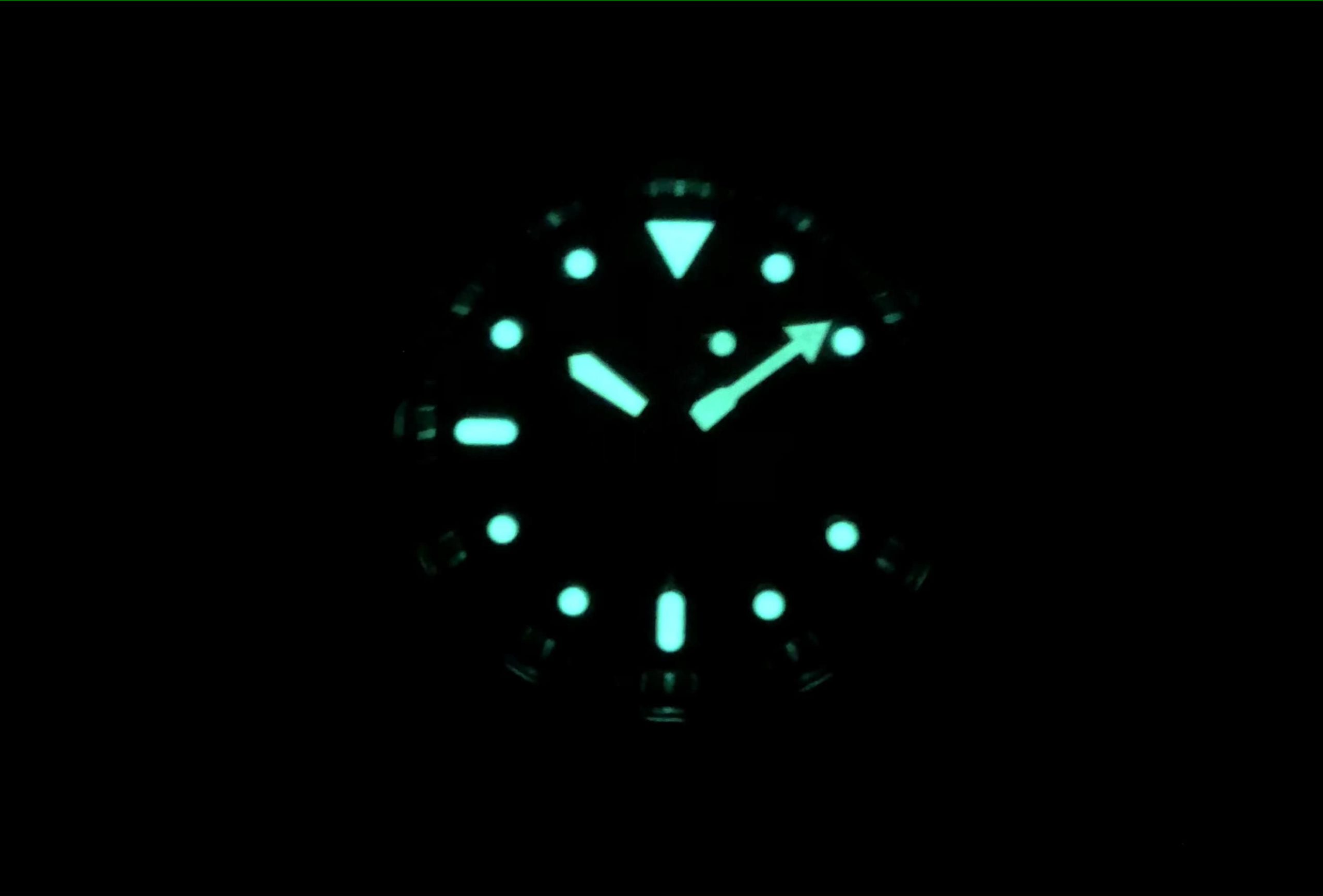 Greenish lume of the Seiko dive watch