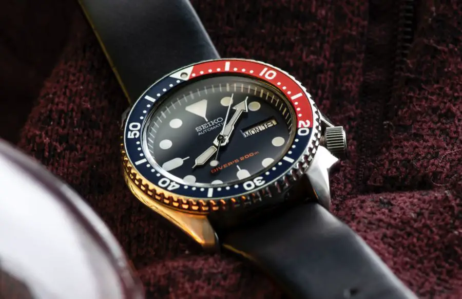 Seiko watch with Pepsi bezel and black band