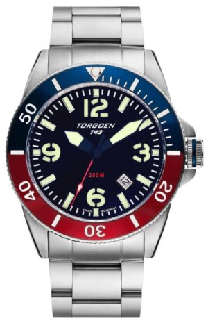 A dive-inspired watch with red and blue bezel and metal band