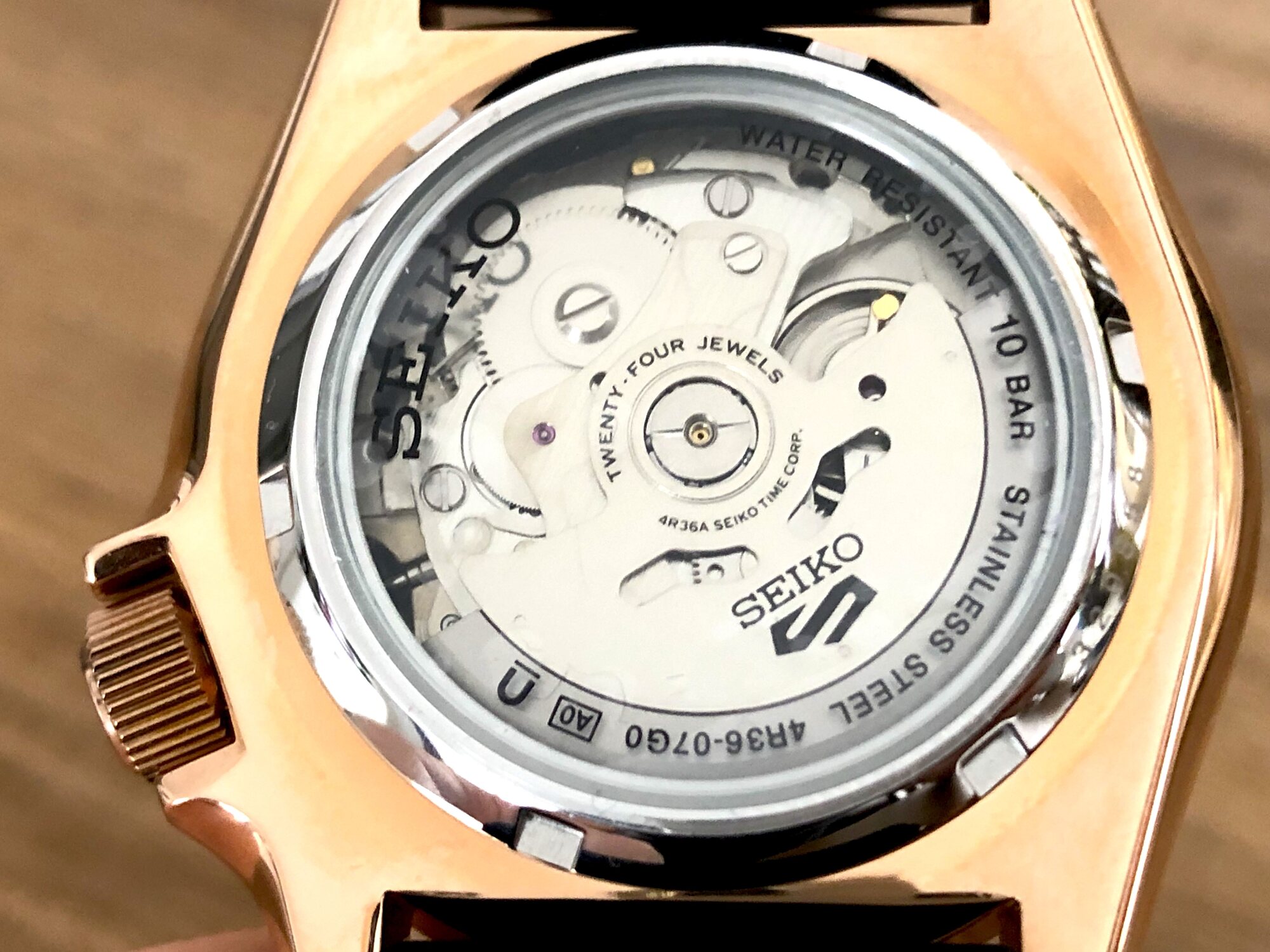 Transparent caseback with gears and wheels visible